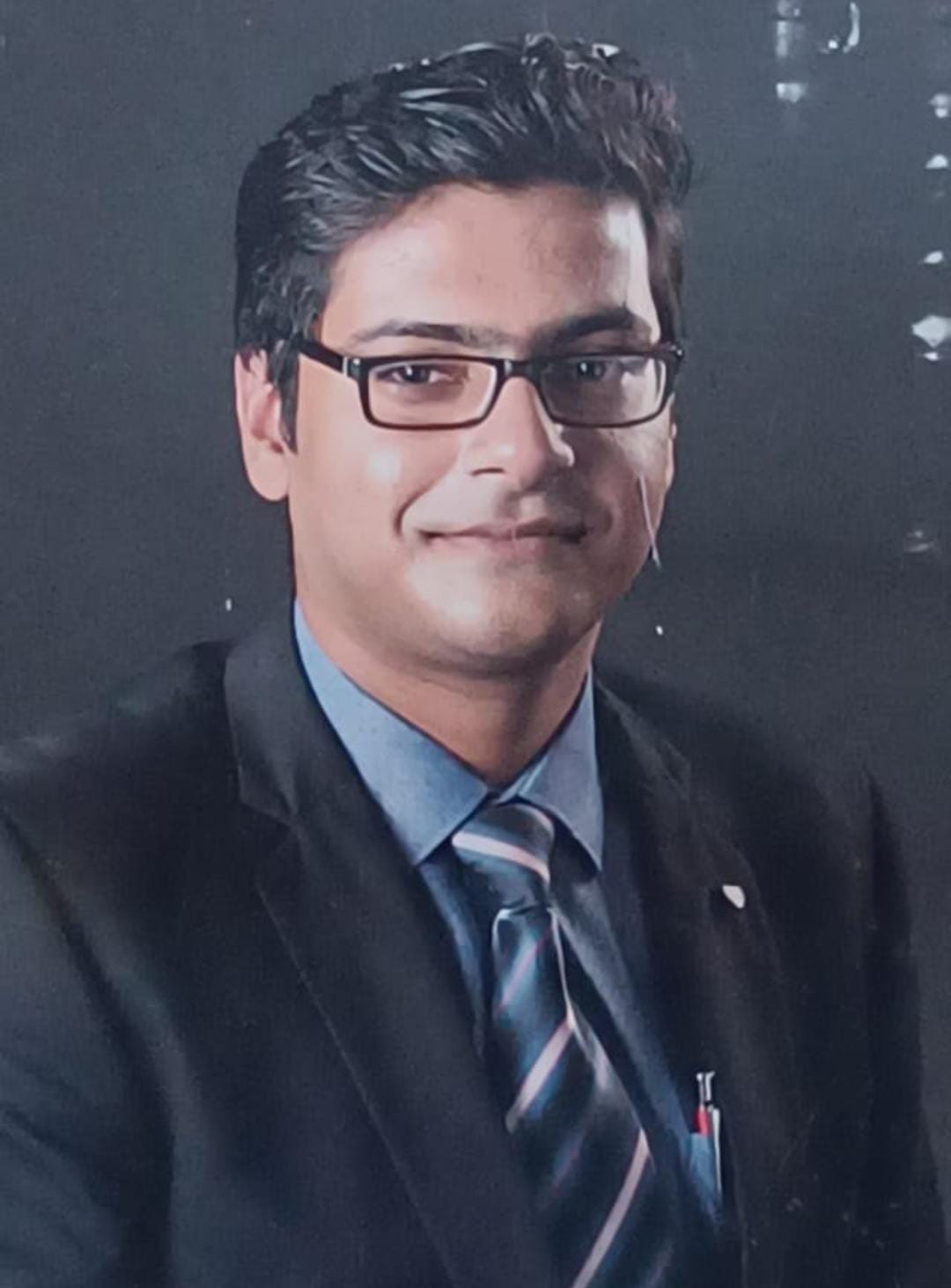 Dr. Tirthankar Roy